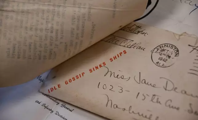 An envelope from a Black soldier stationed in Alabama written to his wife in Nashville in 1942 shows a stamp that says "Idle Gossip Sinks Ships" Monday, Feb. 9, 2026 in Nashville, Tenn. (AP Photo/Kristin M. Hall)