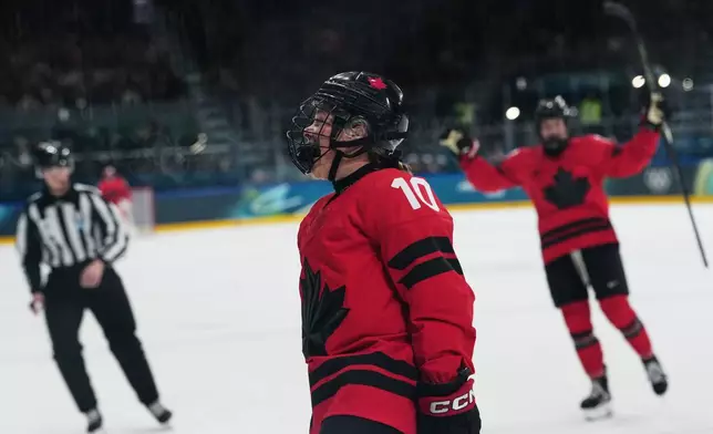 Canada's Sarah Fillier (10) reacts after scoring a goal in the first period against Czechia during a preliminary round match of women's ice hockey at the 2026 Winter Olympics, in Milan, Italy, Monday, Feb. 9, 2026. (AP Photo/Carolyn Kaster)