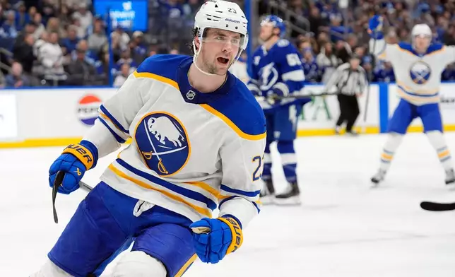 Buffalo Sabres defenseman Mattias Samuelsson (23) celebrates after scoring against the Tampa Bay Lightning during the third period of an NHL hockey game Tuesday, Feb. 3, 2026, in Tampa, Fla. (AP Photo/Chris O'Meara)