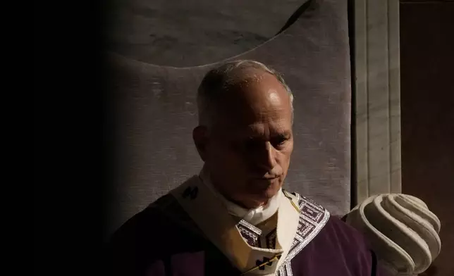 Pope Leo XIV presides over Ash Wednesday Mass, marking the start of the Catholic Lent, inside the Basilica of Santa Sabina in Rome, Wednesday, Feb. 18, 2026. (AP Photo/Gregorio Borgia)