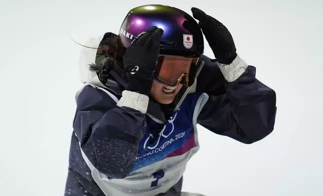 Japan's Kokomo Murase reacts during the women's snowboarding big air finals at the 2026 Winter Olympics, in Livigno, Italy, Monday, Feb. 9, 2026. (AP Photo/Abbie Parr)