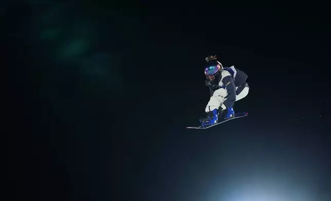 Japan's Kokomo Murase competes during the women's snowboarding big air finals at the 2026 Winter Olympics, in Livigno, Italy, Monday, Feb. 9, 2026. (AP Photo/Gregory Bull)
