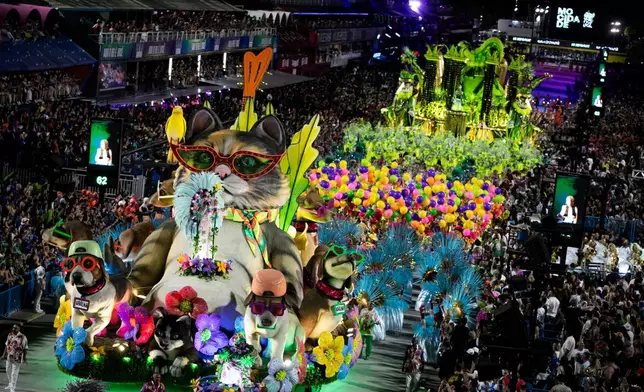 Performers from the Mocidade samba school parade on a float during Carnival celebrations at the Sambadrome in Rio de Janeiro, Monday, Feb. 16, 2026. (AP Photo/Bruna Prado)