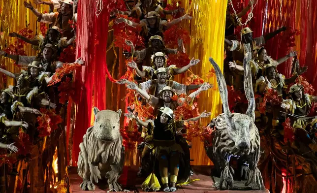 Performers from the Academicos de Niteroi samba school parade on a float during Carnival celebrations at the Sambadrome, in Rio de Janeiro, Sunday, Feb. 15, 2026. (AP Photo/Bruna Prado)