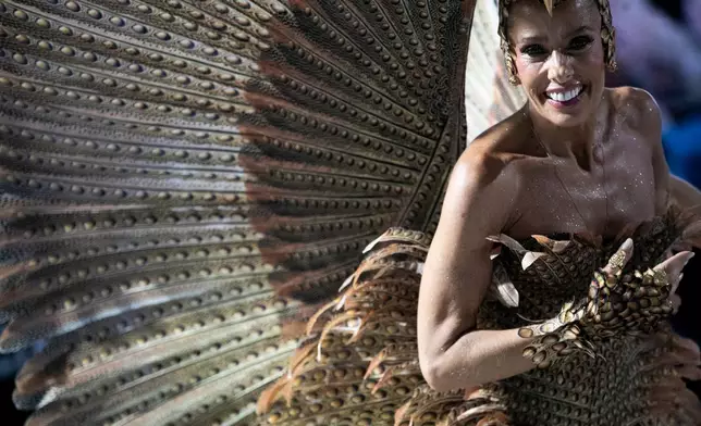 Former model and actress Adriane Galisteu parades at the Portela samba school during Carnival celebrations at the Sambadrome in Rio de Janeiro, early Monday, Feb. 16, 2026. (AP Photo/Bruna Prado)