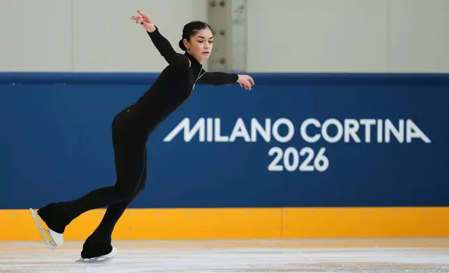 Individual Neutral Athlete Adeliia Petrosian skates during a figure skating practice session at the 2026 Winter Olympics, in Milan, Italy, Monday, Feb. 16, 2026. (AP Photo/Stephanie Scarbrough)