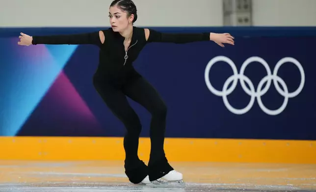 Individual Neutral Athlete Adeliia Petrosian skates during a figure skating practice session at the 2026 Winter Olympics, in Milan, Italy, Monday, Feb. 16, 2026. (AP Photo/Stephanie Scarbrough)