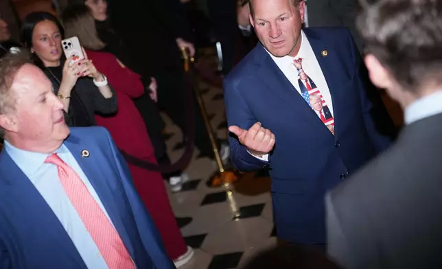 Texas Attorney General Ken Paxton and Rep. Troy Nehls, R-Texas, arrive before President Donald Trump delivers the State of the Union address to a joint session of Congress in the House chamber at the U.S. Capitol in Washington, Tuesday, Feb. 24, 2026. (AP Photo/Allison Robbert)