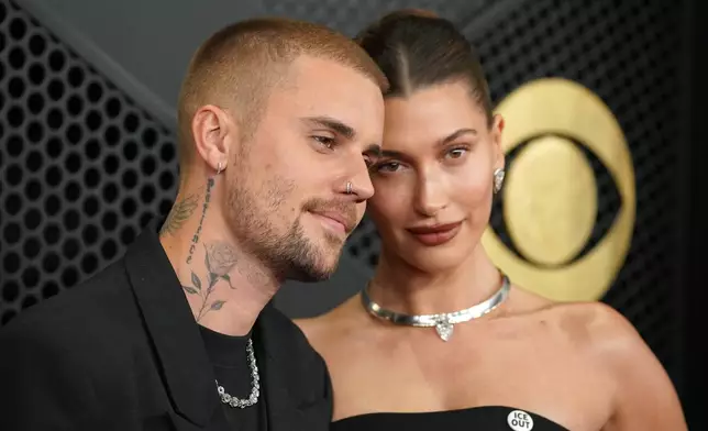 Justin Bieber, left, and Hailey Bieber arrive at the 68th annual Grammy Awards on Sunday, Feb. 1, 2026, in Los Angeles. (Photo by Jordan Strauss/Invision/AP)