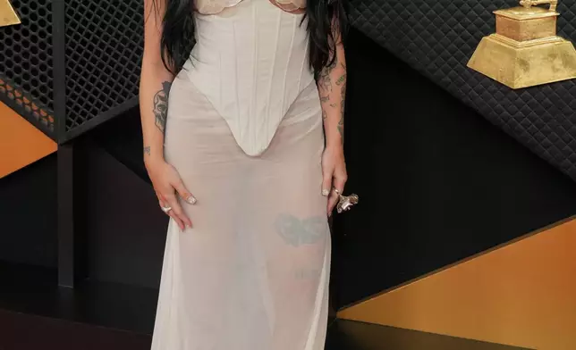 Nicki Nicole arrives at the 68th annual Grammy Awards on Sunday, Feb. 1, 2026, in Los Angeles. (Photo by Jordan Strauss/Invision/AP)