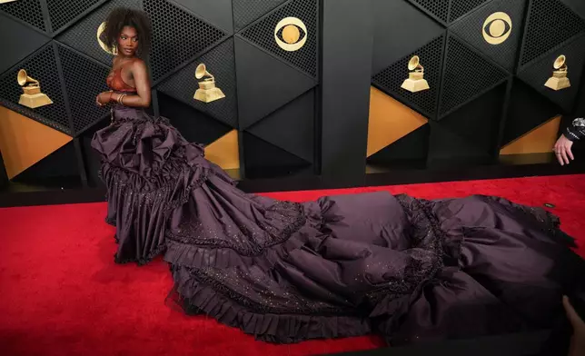 Doechii arrives at the 68th annual Grammy Awards on Sunday, Feb. 1, 2026, in Los Angeles. (Photo by Jordan Strauss/Invision/AP)