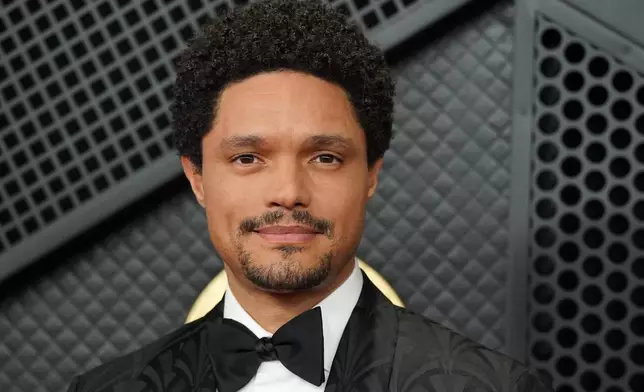 Trevor Noah arrives at the 68th annual Grammy Awards on Sunday, Feb. 1, 2026, in Los Angeles. (Photo by Jordan Strauss/Invision/AP)