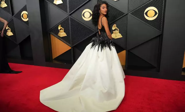 Olivia Dean arrives at the 68th annual Grammy Awards on Sunday, Feb. 1, 2026, in Los Angeles. (Photo by Jordan Strauss/Invision/AP)