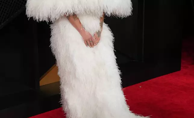 Kesha arrives at the 68th annual Grammy Awards on Sunday, Feb. 1, 2026, in Los Angeles. (Photo by Jordan Strauss/Invision/AP)