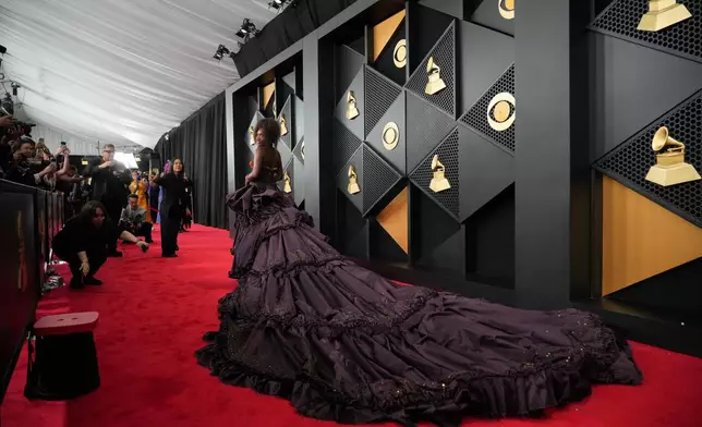 Doechii arrives at the 68th annual Grammy Awards on Sunday, Feb. 1, 2026, in Los Angeles. (Photo by Jordan Strauss/Invision/AP)