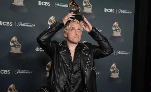 Andrew Watt poses in the press room with the award for best dance pop recording for "Abracadabra" during the 68th annual Grammy Awards on Sunday, Feb. 1, 2026, in Los Angeles. (Photo by Richard Shotwell/Invision/AP)