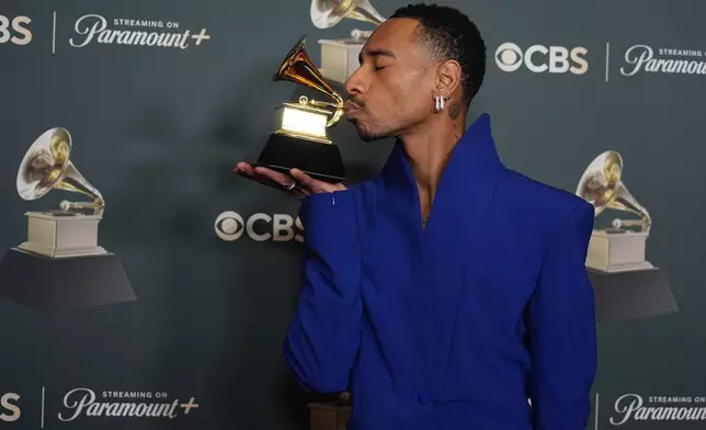 Durand Bernarr poses in the press room with the award for best progressive R&amp;B album for "Bloom" during the 68th annual Grammy Awards on Sunday, Feb. 1, 2026, in Los Angeles. (Photo by Richard Shotwell/Invision/AP)
