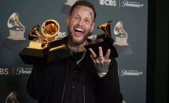 Jelly Roll poses in the press room with the award for best contemporary country album for "Beautifully Broken" during the 68th annual Grammy Awards on Sunday, Feb. 1, 2026, in Los Angeles. (Photo by Richard Shotwell/Invision/AP)