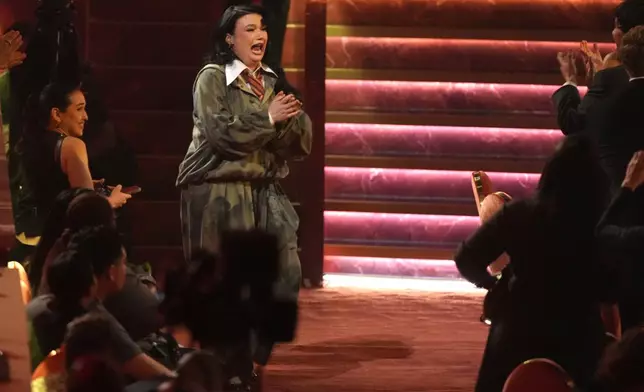 Lola Young accepts the award for best pop solo performance for "Messy" during the 68th annual Grammy Awards on Sunday, Feb. 1, 2026, in Los Angeles. (AP Photo/Chris Pizzello)