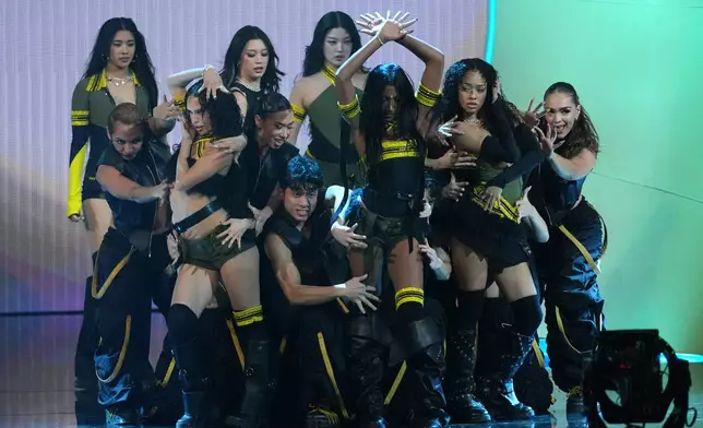 KATSEYE performs "Gnarly" during the 68th annual Grammy Awards on Sunday, Feb. 1, 2026, in Los Angeles. (AP Photo/Chris Pizzello)