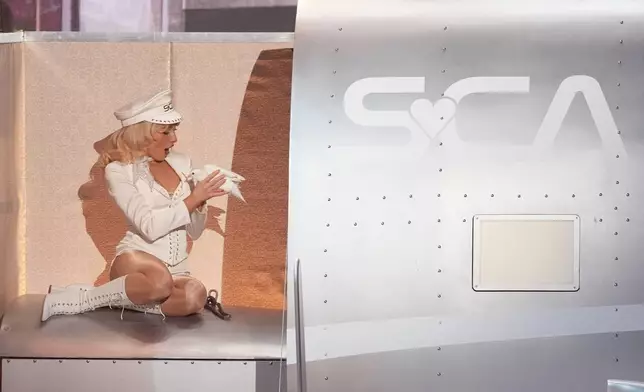 Sabrina Carpenter performs "Manchild" during the 68th annual Grammy Awards on Sunday, Feb. 1, 2026, in Los Angeles. (AP Photo/Chris Pizzello)