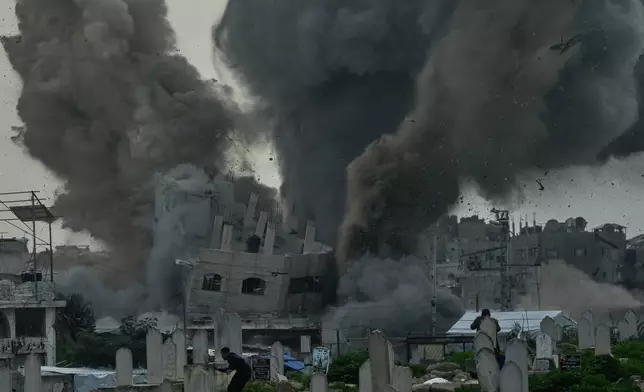 Smoke rises from an Israeli military strike on a building in the Zeitoun neighborhood of Gaza City, Friday, Feb. 6, 2026. (AP Photo/Jehad Alshrafi)