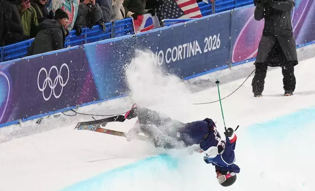 United States' Nick Goepper crashes during the men's freestyle skiing halfpipe finals at the 2026 Winter Olympics, in Livigno, Italy, Friday, Feb. 20, 2026. (AP Photo/Abbie Parr)