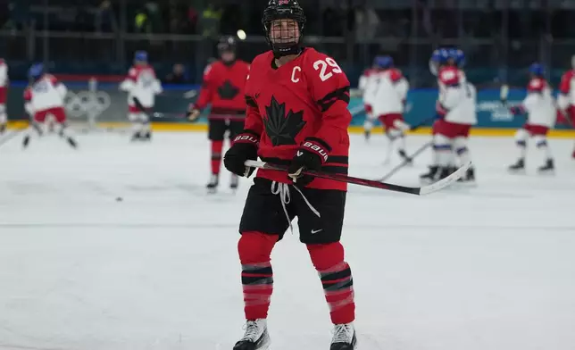 Canada's Marie-Philip Poulin (29) skates during warmups before a preliminary round match of women's ice hockey against Czechia at the 2026 Winter Olympics, in Milan, Italy, Monday, Feb. 9, 2026. (AP Photo/Carolyn Kaster)