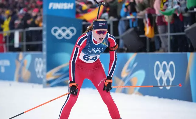 Maren Kirkeeide, of Norway, reacts after the women's 7.5-kilometer sprint biathlon race at the 2026 Winter Olympics in Anterselva, Italy, Saturday, Feb. 14, 2026. (AP Photo/Andrew Medichini)
