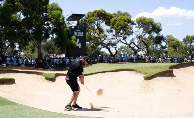 Captain Bryson DeChambeau of Crushers GC hits his shot from a bunker on the fourth hole during the final round of the LIV Golf Adelaide at Grange Golf Club in Adelaide, Australia Sunday, Feb. 15, 2026. (Charles Laberge/LIV Golf via AP)