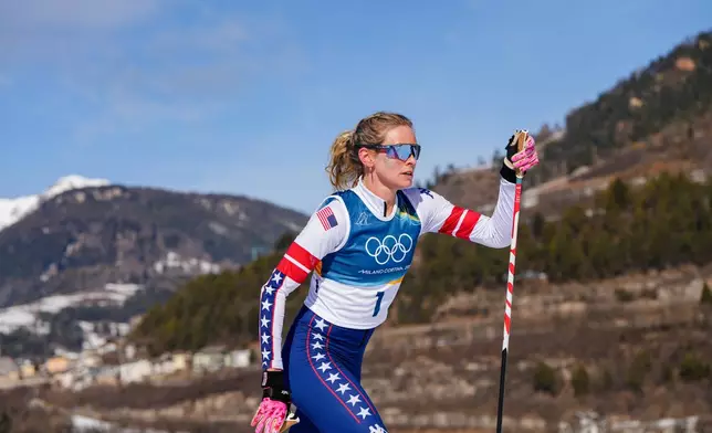 Jessie Diggins, of the United States, competes in the cross country skiing women's 50km mass start classic at the 2026 Winter Olympics, in Tesero, Italy, Sunday, Feb. 22, 2026. (AP Photo/Kirsty Wigglesworth)