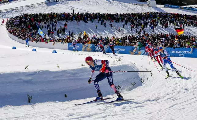 Jessie Diggins, of the United States, competes in the cross-country skiing women's team sprint free at the 2026 Winter Olympics, in Tesero, Italy, Wednesday, Feb. 18, 2026. (AP Photo/Evgeniy Maloletka)