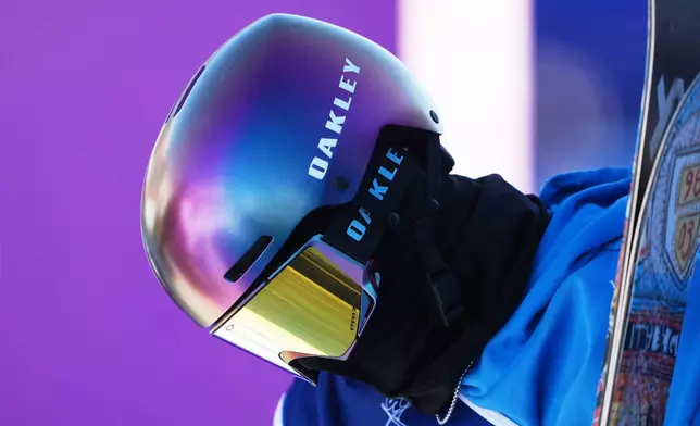 Italy's Miro Tabanelli reacts during men's freestyle skiing slopestyle qualifications at the 2026 Winter Olympics, in Livigno, Italy, Saturday, Feb. 7, 2026. (AP Photo/Lindsey Wasson)