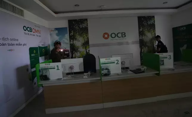 Thai soldiers inspect a scam compound in O'Smach, Cambodia, Monday, Feb. 2, 2026, (AP Photo/Sakchai Lalit)