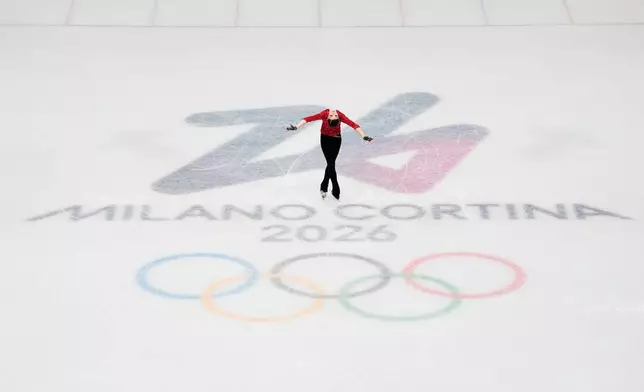 Adeliia Petrosian of Individual Neutral Athletes competes during the women's short program figure skating at the 2026 Winter Olympics, in Milan, Italy, Tuesday, Feb. 17, 2026. (AP Photo/Ashley Landis)