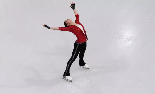 Adeliia Petrosian of Individual Neutral Athletes competes during the women's short program figure skating at the 2026 Winter Olympics, in Milan, Italy, Tuesday, Feb. 17, 2026. (AP Photo/Bernat Armangue)