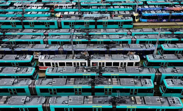 Subway trains are parked in a depot as employees of the public traffic are on strike in Frankfurt, Germany, Tuesday, Feb. 24, 2026. (AP Photo/Michael Probst)