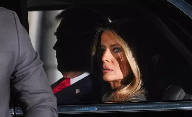 First lady Melania Trump and President Donald Trump are seated in their motorcade on the South Lawn of the White House, before traveling to the Capitol where President Trump will give the State of the Union address, Wednesday, Feb. 24, 2026, in Washington. (AP Photo/Evan Vucci)