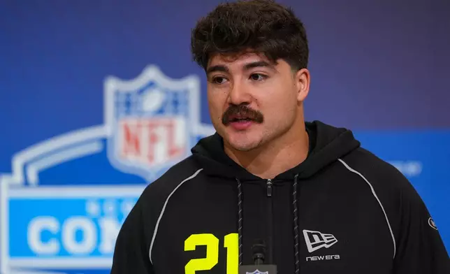 Texas Tech linebacker Jacob Rodriguez (21) speaks during a press conference at the NFL football scouting combine in Indianapolis, Wednesday, Feb. 25, 2026. (AP Photo/Michael Conroy)