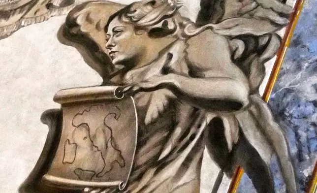 A detail of a restored chapel with Angels depicted on a fresco to the memory of late Italy's King Umberto II inside the Basilica of St. Lawrence in Lucina in Rome, Sunday, Feb. 1, 2026. (AP Photo/Gregorio Borgia)