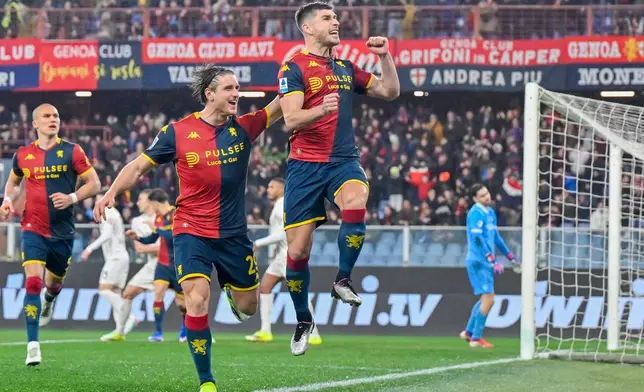 Genoa's Ruslan Malinovskyi celebrates after scoring a goal during the Serie A soccer match between Genoa and Napoli, Saturday, Feb. 7, 2026, Genoa, Italy. (Tano Pecoraro/LaPresse via AP)