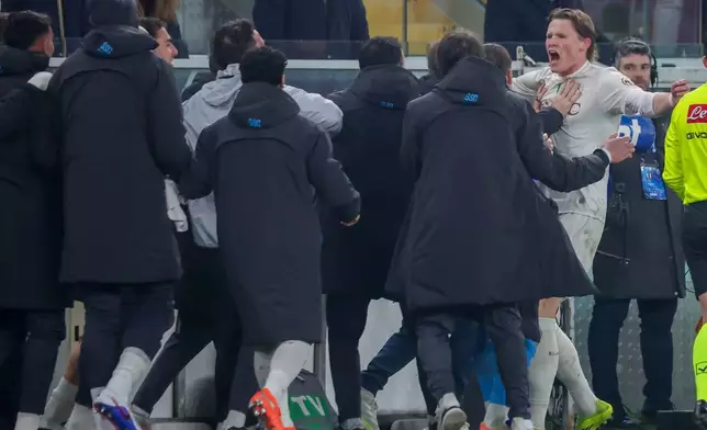 Napoli's Scott McTominay celebrates after scoring a goal during the Serie A soccer match between Genoa and Napoli, Saturday, Feb. 7, 2026, Genoa, Italy. (Tano Pecoraro/LaPresse via AP)