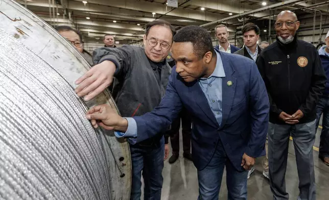 U.S. Congressman Don Davis and Gisu Kim, Regional President of North America, LS Cable &amp; System