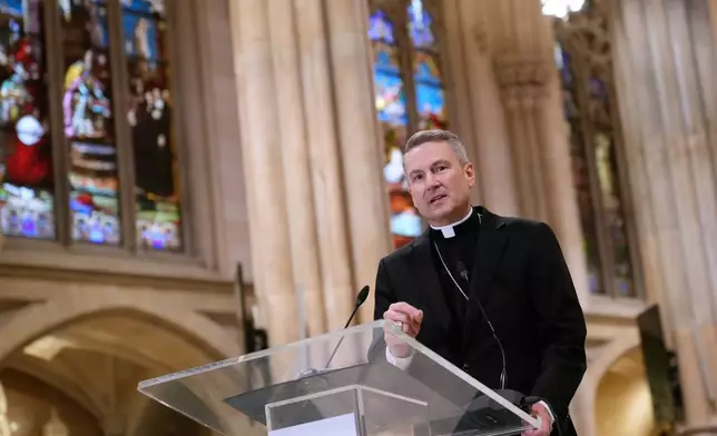 Archbishop-designate Ronald Hicks talks to reporters during a news conference at St. Patrick's Cathedral in New York, Thursday, Feb. 5, 2026. (AP Photo/Seth Wenig)