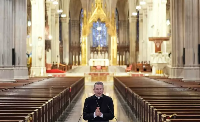 Archbishop-designate Ronald Hicks talks to reporters during a news conference at St. Patrick's Cathedral in New York, Thursday, Feb. 5, 2026. (AP Photo/Seth Wenig)