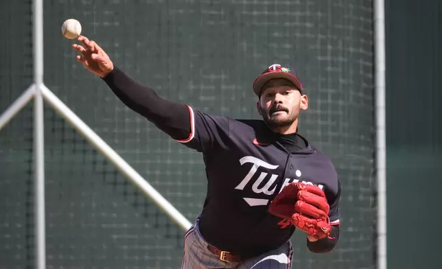 Minnesota Twins pitcher Pablo Lopez throws during a spring training baseball workout in Fort Myers, Fla., Monday, Feb. 16, 2026. (AP Photo/Gerald Herbert)