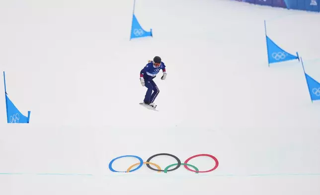 United States' Faye Thelen practices during a snowboard cross training session at the 2026 Winter Olympics, in Livigno, Italy, Friday, Feb. 6, 2026. (AP Photo/Lindsey Wasson)