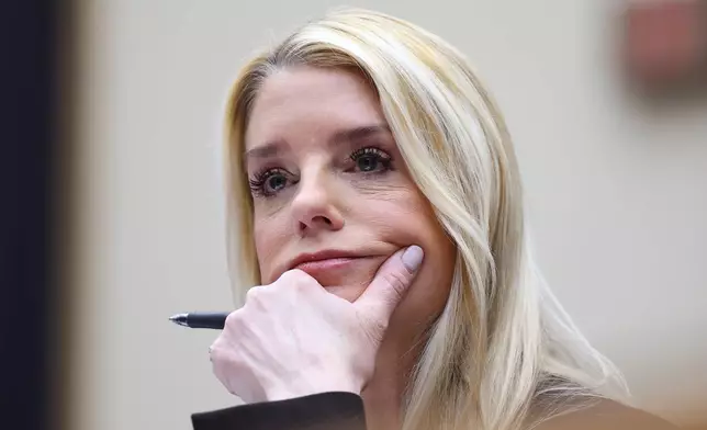FILE - Attorney General Pam Bondi listens as she testifies before a House Judiciary Committee oversight hearing on Capitol Hill in Washington, Feb. 11, 2026, in Washington. (AP Photo/Tom Brenner, file)