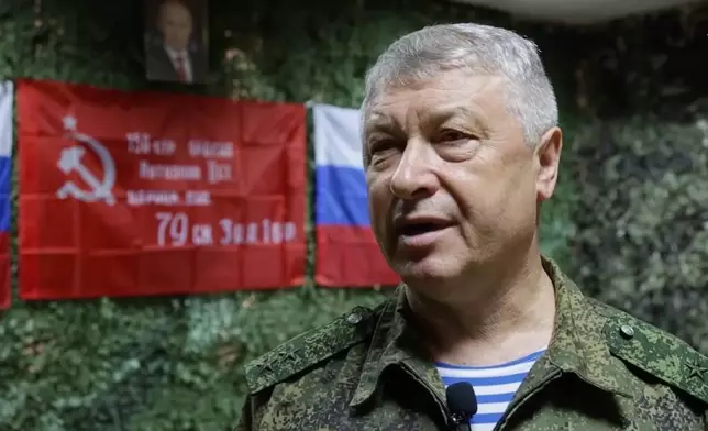 In this image made from video provided by Russian Defense Ministry Press Service on Wednesday, June 14, 2023, Lt. Gen. Vladimir Alekseyev speaks to servicemen in an undisclosed location. (Russian Defense Ministry Press Service via AP)