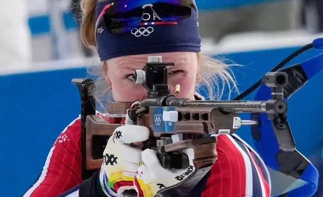 Norway's Karoline Offigstad Knotten shoots during the women's biathlon 4 x 6-kilometers relay race at the 2026 Winter Olympics, in Anterselva, Italy, Wednesday, Feb. 18, 2026. (AP Photo/David J. Phillip)